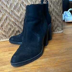 Has a few scuffs, but the tread on the bottom is good as new.